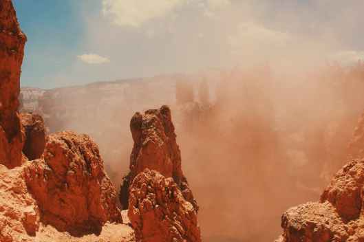 sand storm and rock formation