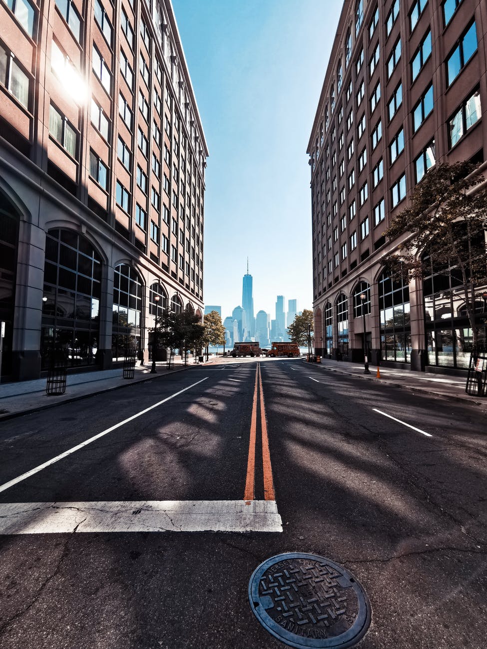 road in between buildings