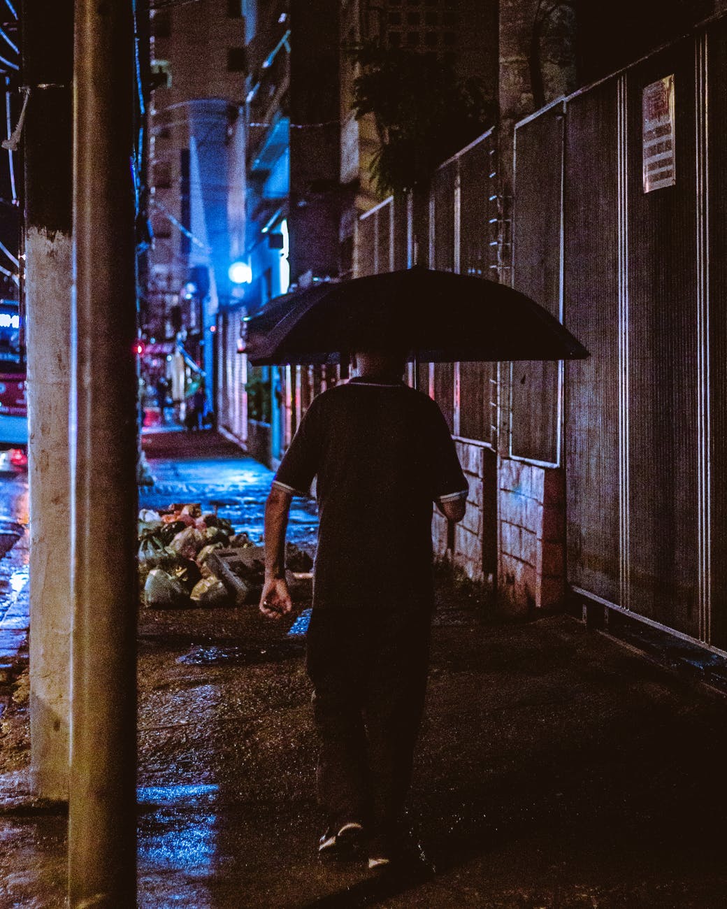man holding umbrella